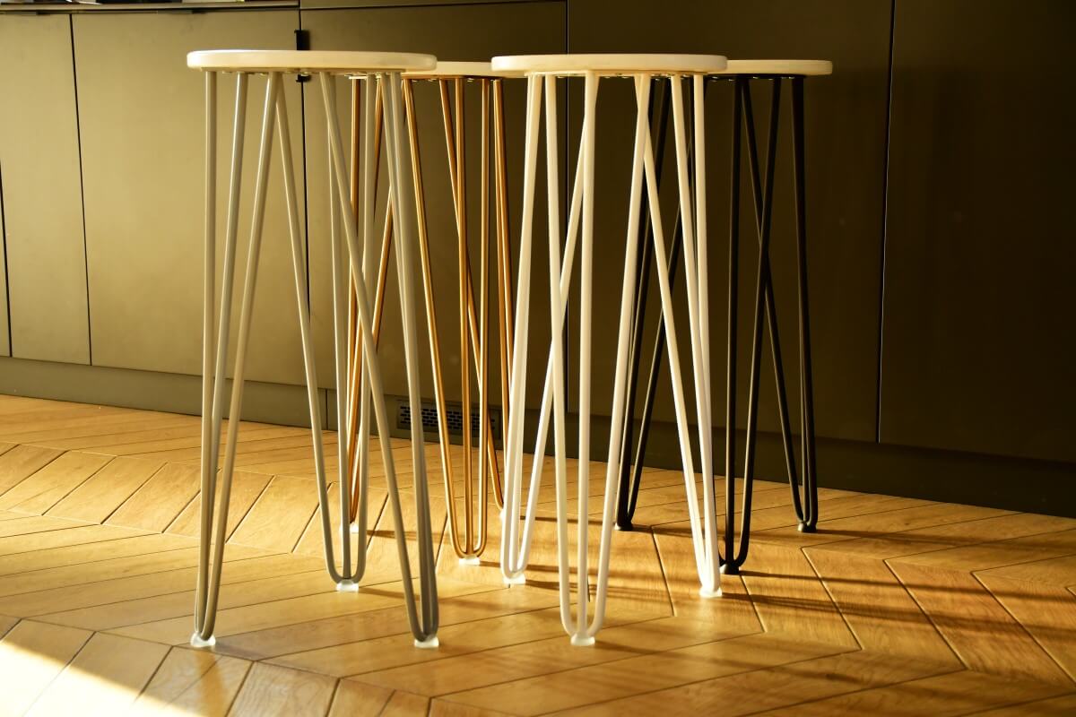 Coloured hairpin legs, adding a modern touch